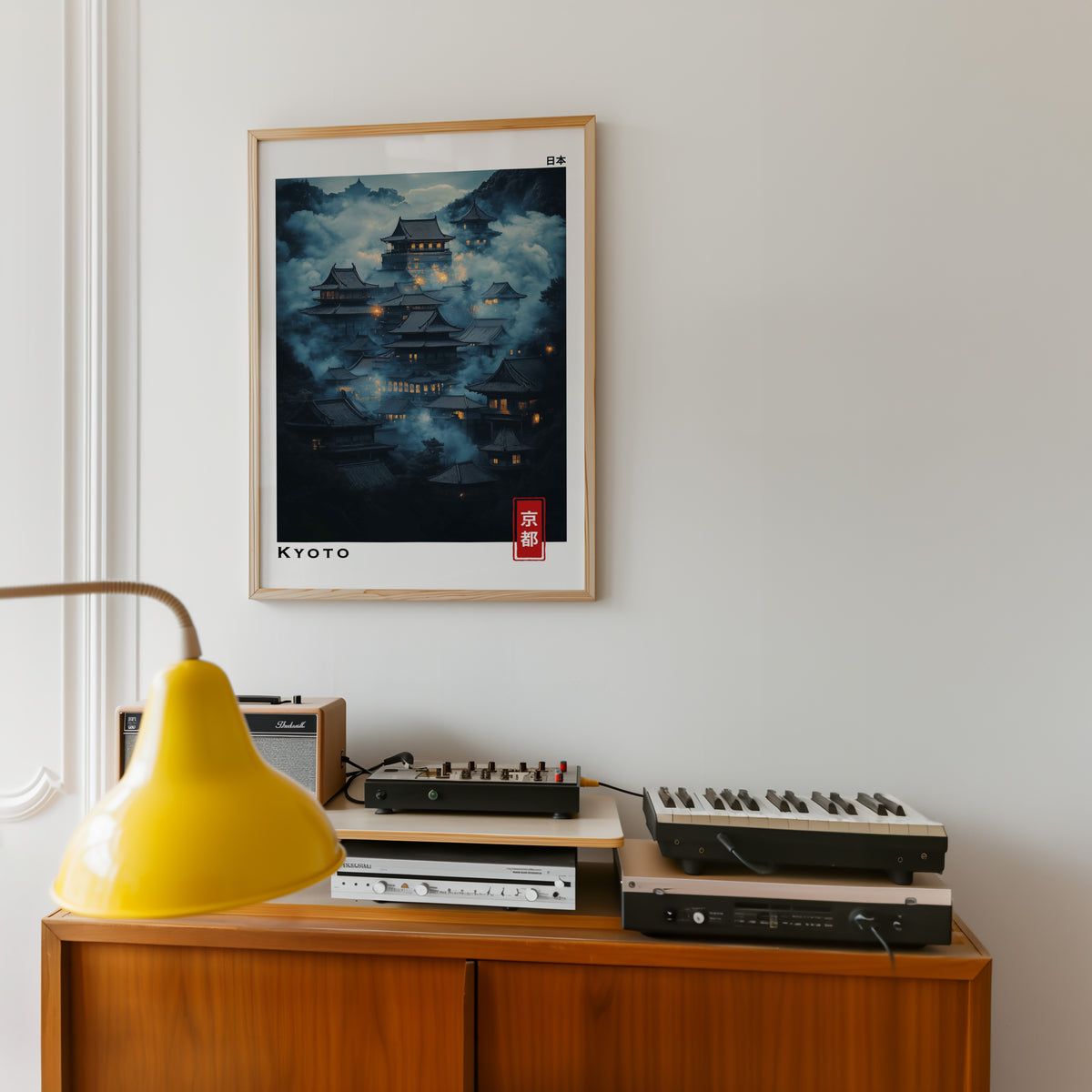 Kyoto misty night temples print in an oak frame above a teak sideboard with vintage hi-fi