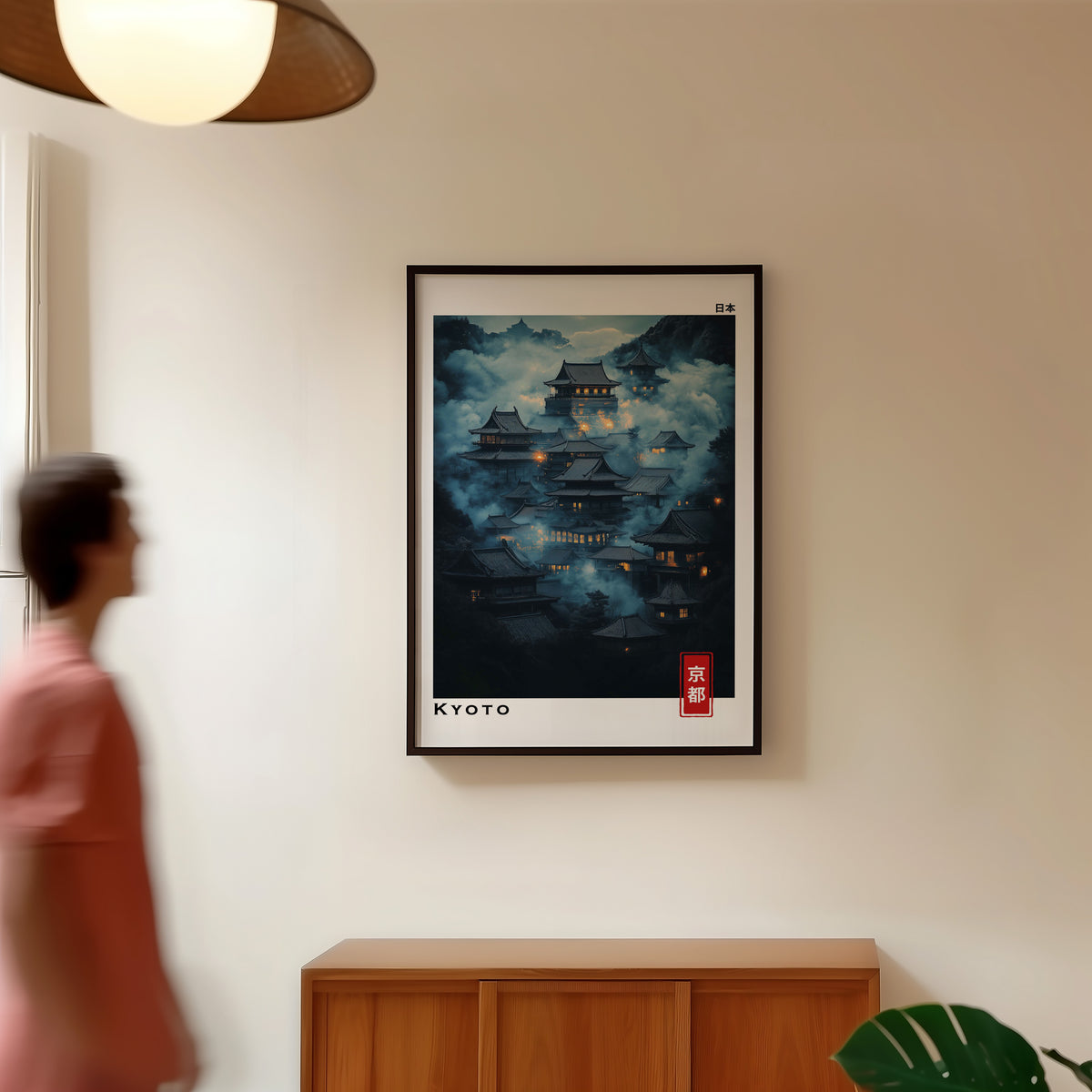 Kyoto misty night temples print in a black frame in a hallway under a rattan pendant