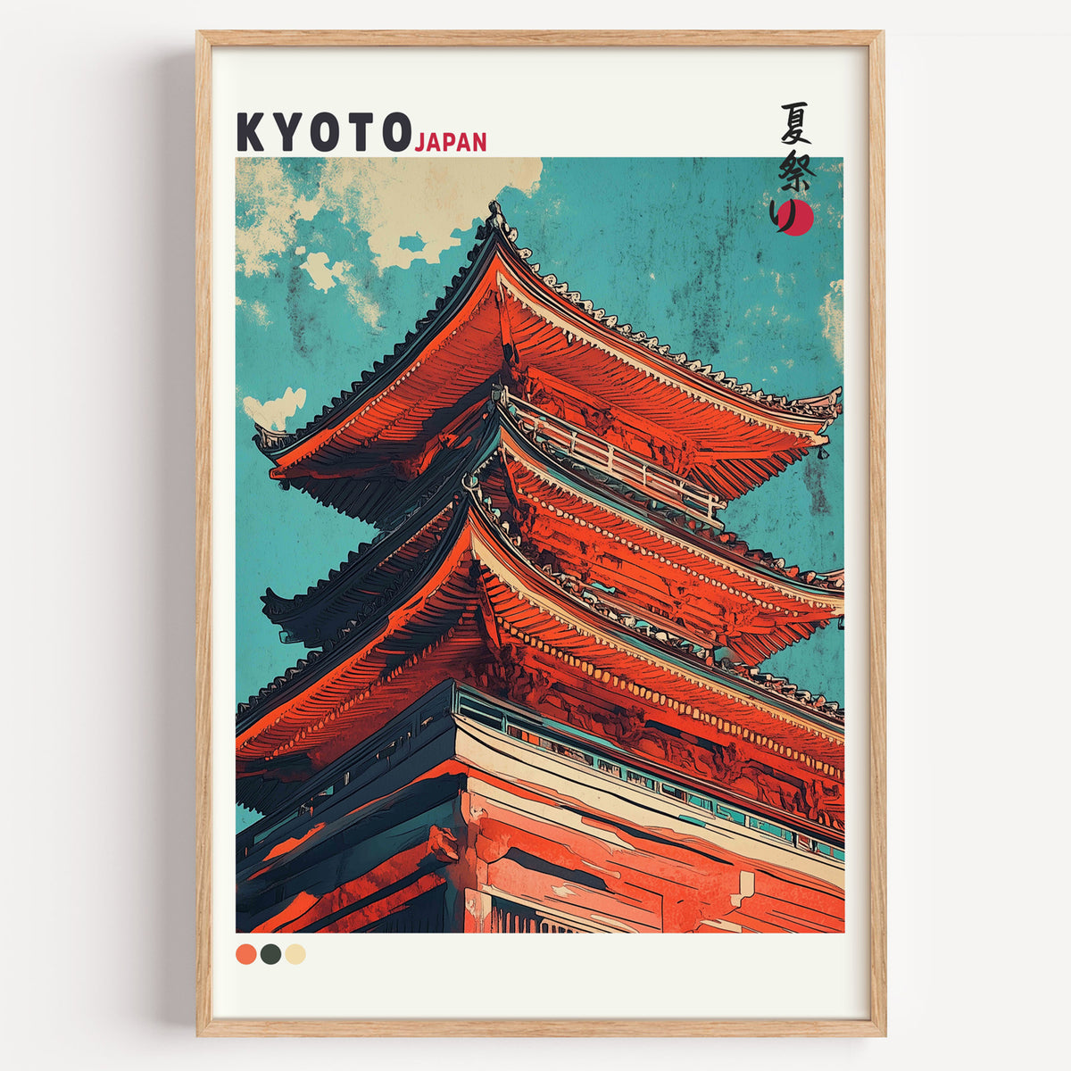 Red pagoda roofs under teal sky print in a light oak frame on a plain white wall