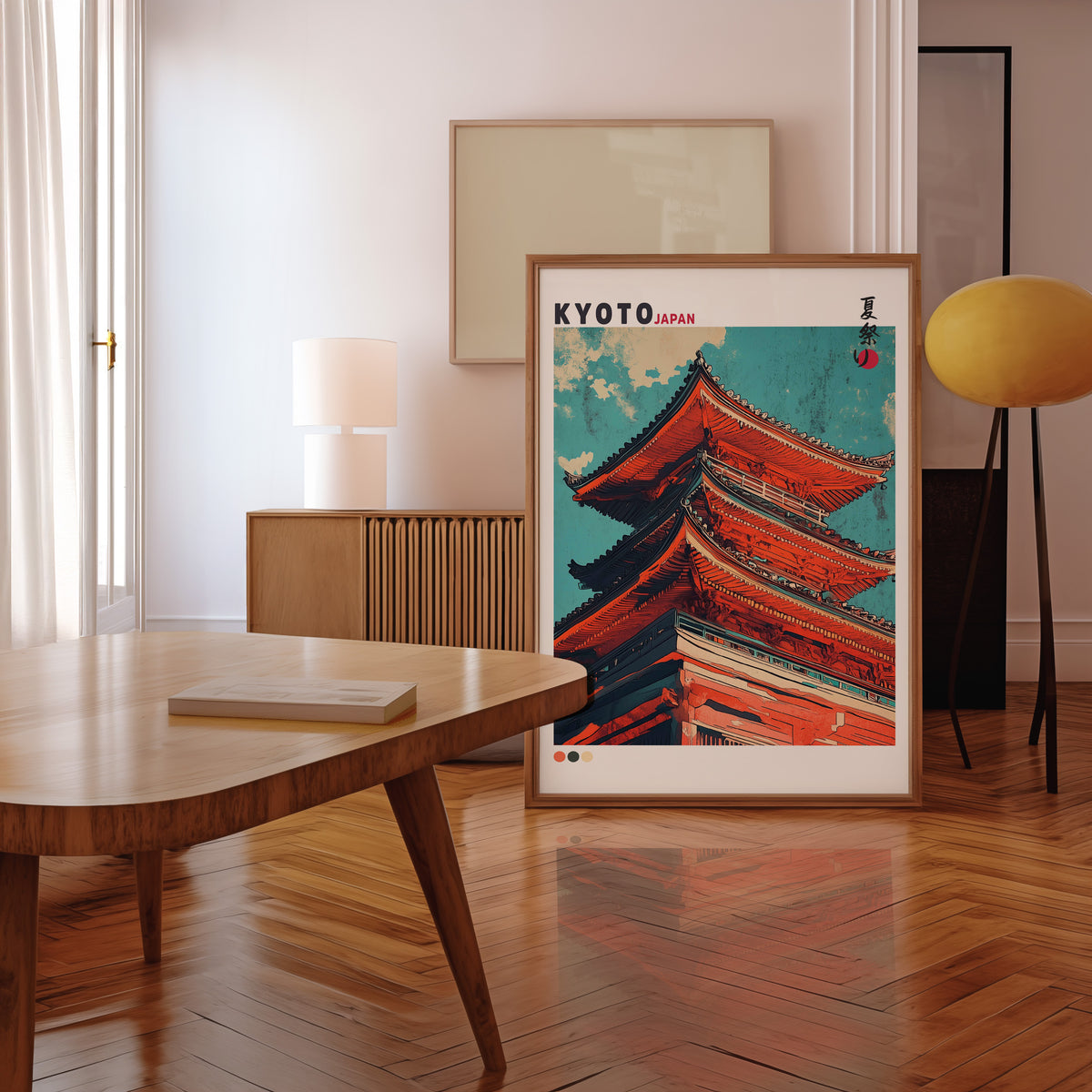 Red pagoda roofs under teal sky print in a walnut frame leaning in a mid-century living room