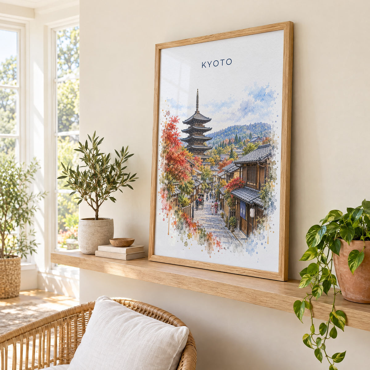 Kyoto watercolor print in an oak frame on a picture ledge in a sunlit sunroom