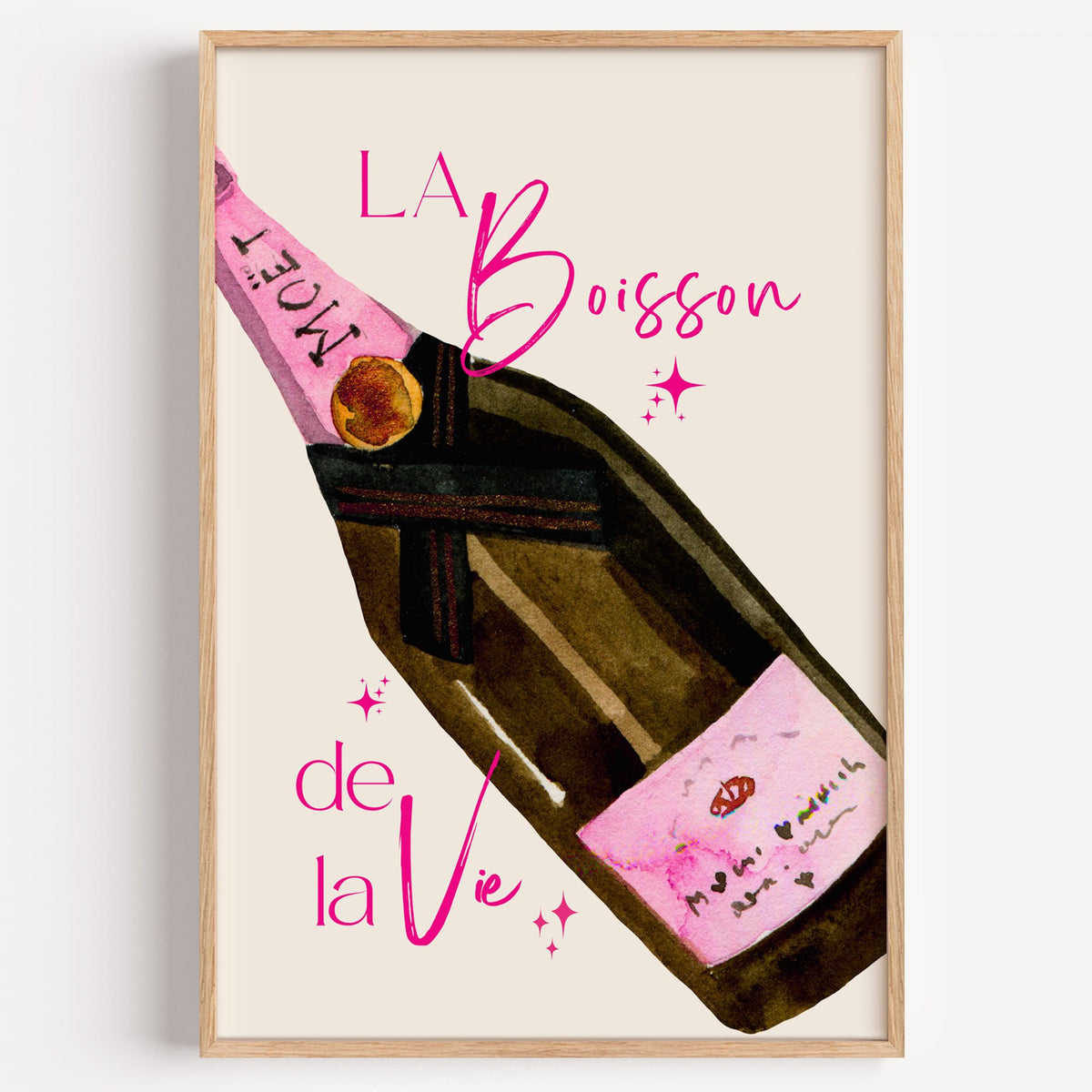 La Boisson champagne bottle watercolor print in a light oak frame on a plain white wall