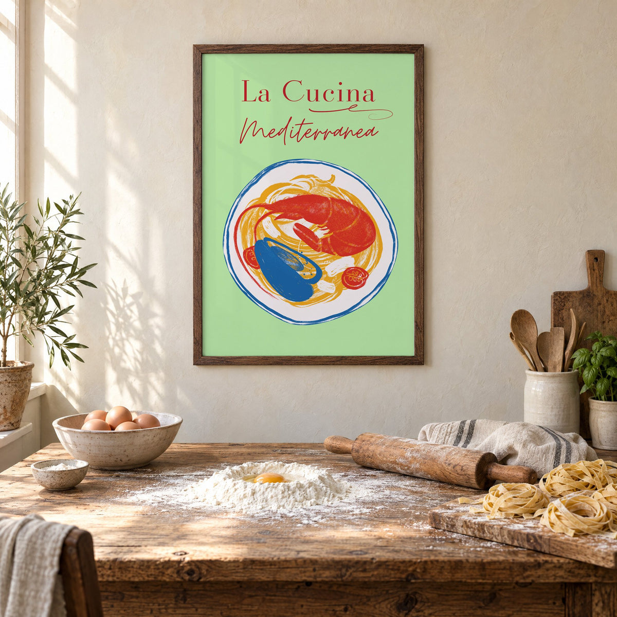La Cucina Mediterranea seafood pasta print in a walnut frame above a rustic table set for making fresh pasta