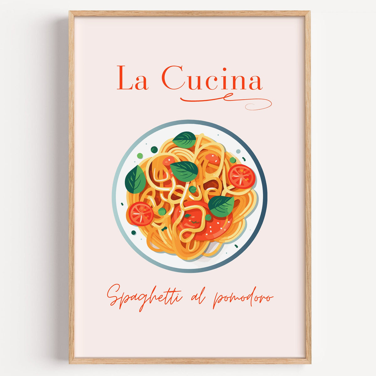 La Cucina spaghetti plate print in a light oak frame on a plain white wall