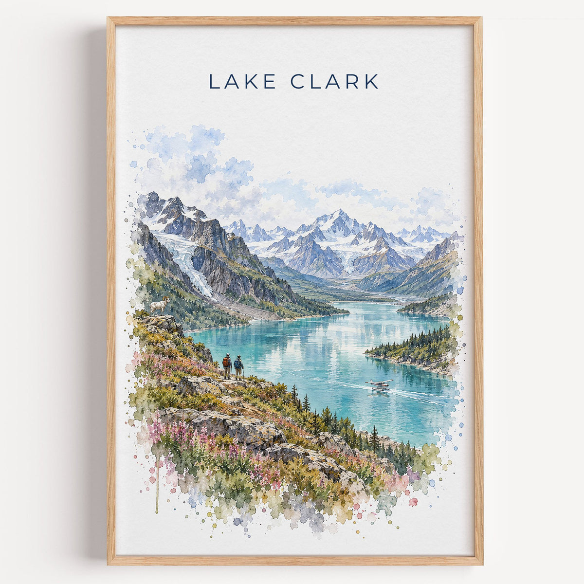 Lake Clark National Park watercolor print in a light oak frame on a plain white wall