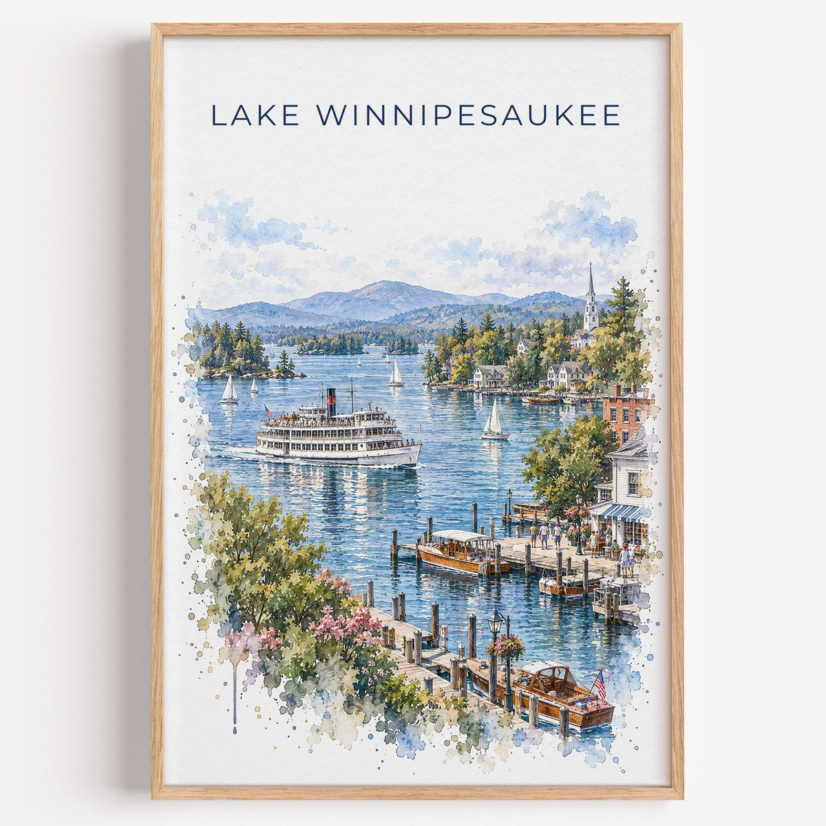 Lake Winnipesaukee watercolor print in a light oak frame on a plain white wall