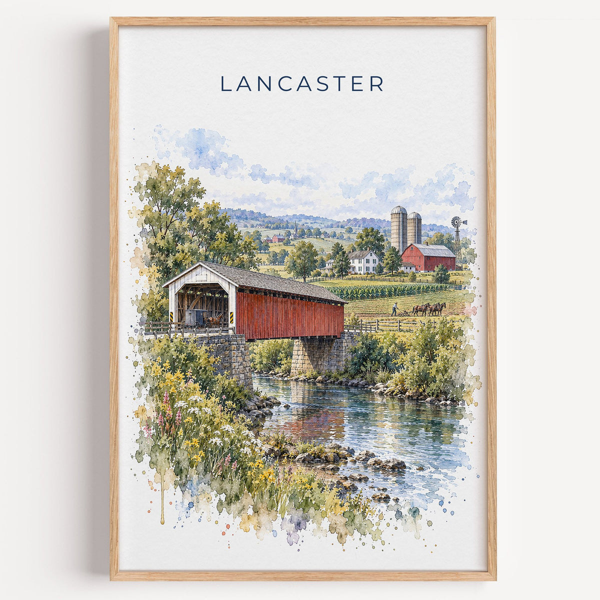 Lancaster, Pennsylvania watercolor print in a light oak frame on a plain white wall