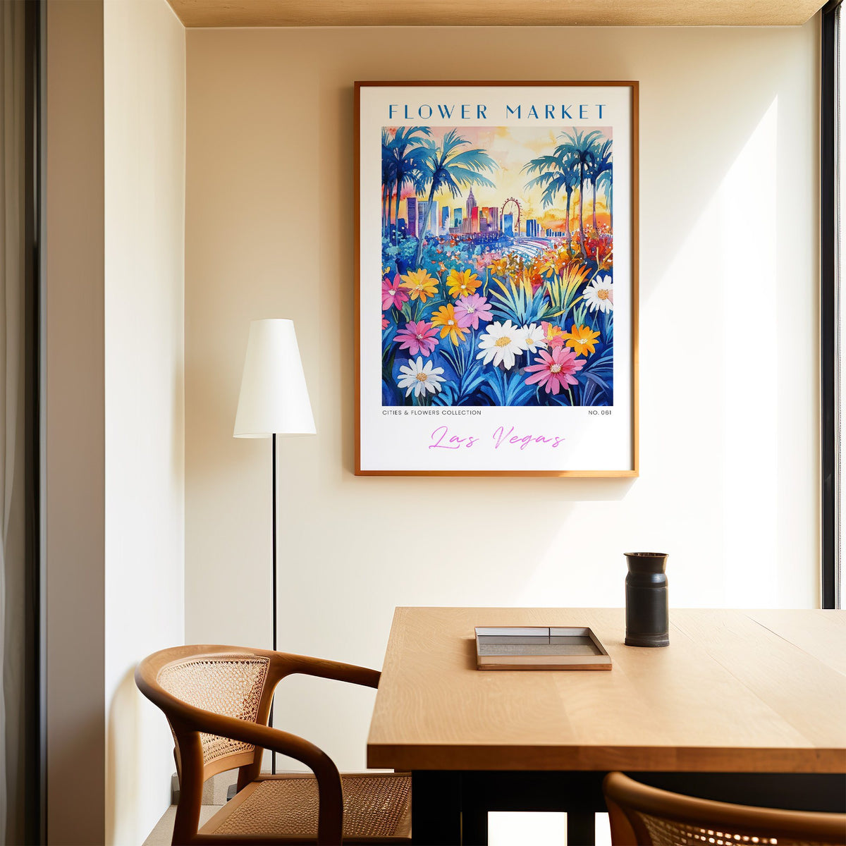 Las Vegas flower market print in an oak frame above a dining table and cane chair