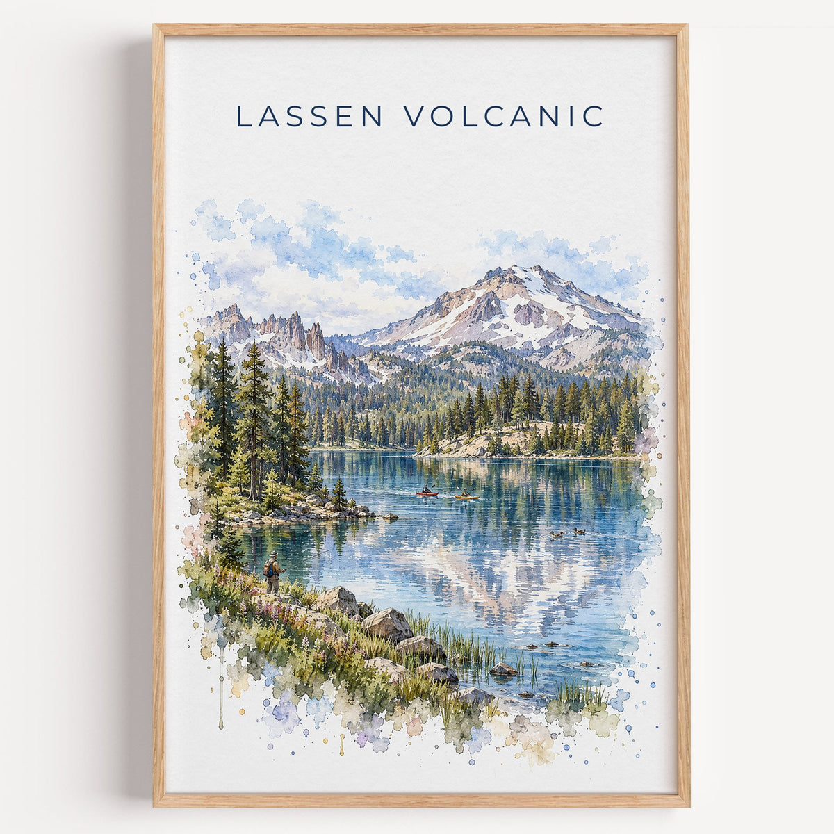 Lassen Volcanic National Park watercolor print in a light oak frame on a plain white wall