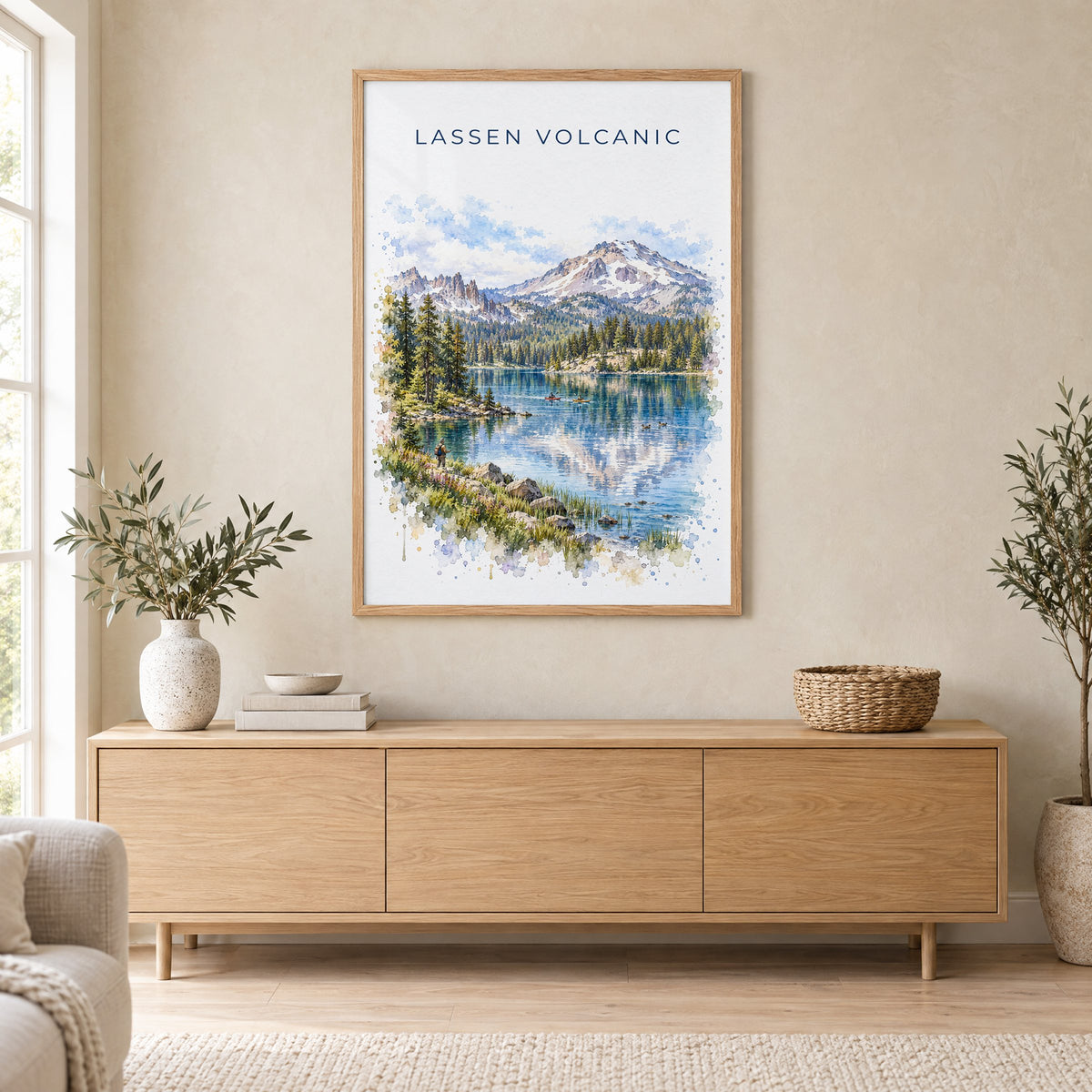 Lassen Volcanic National Park watercolor print in an oak frame above a light wood sideboard in a Scandinavian living room