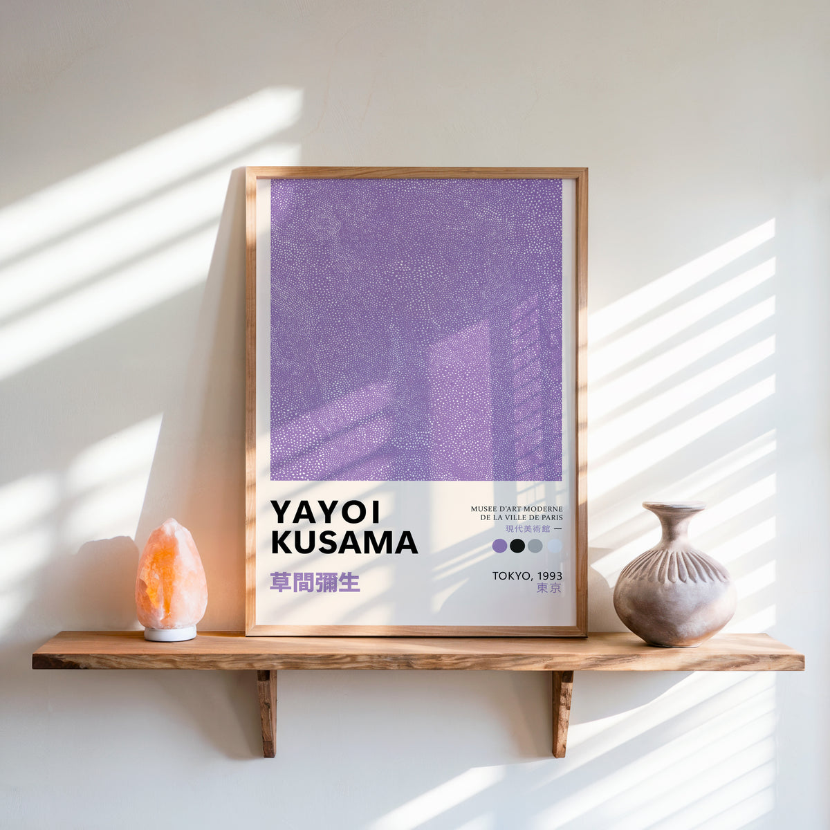 Yayoi Kusama inspired lavender dotted texture print above a shelf with a salt lamp