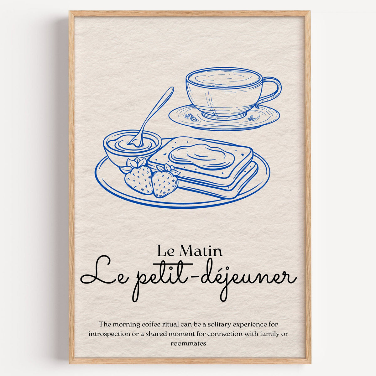 Le petit-dejeuner cobalt engraved breakfast print in a light oak frame on a plain white wall