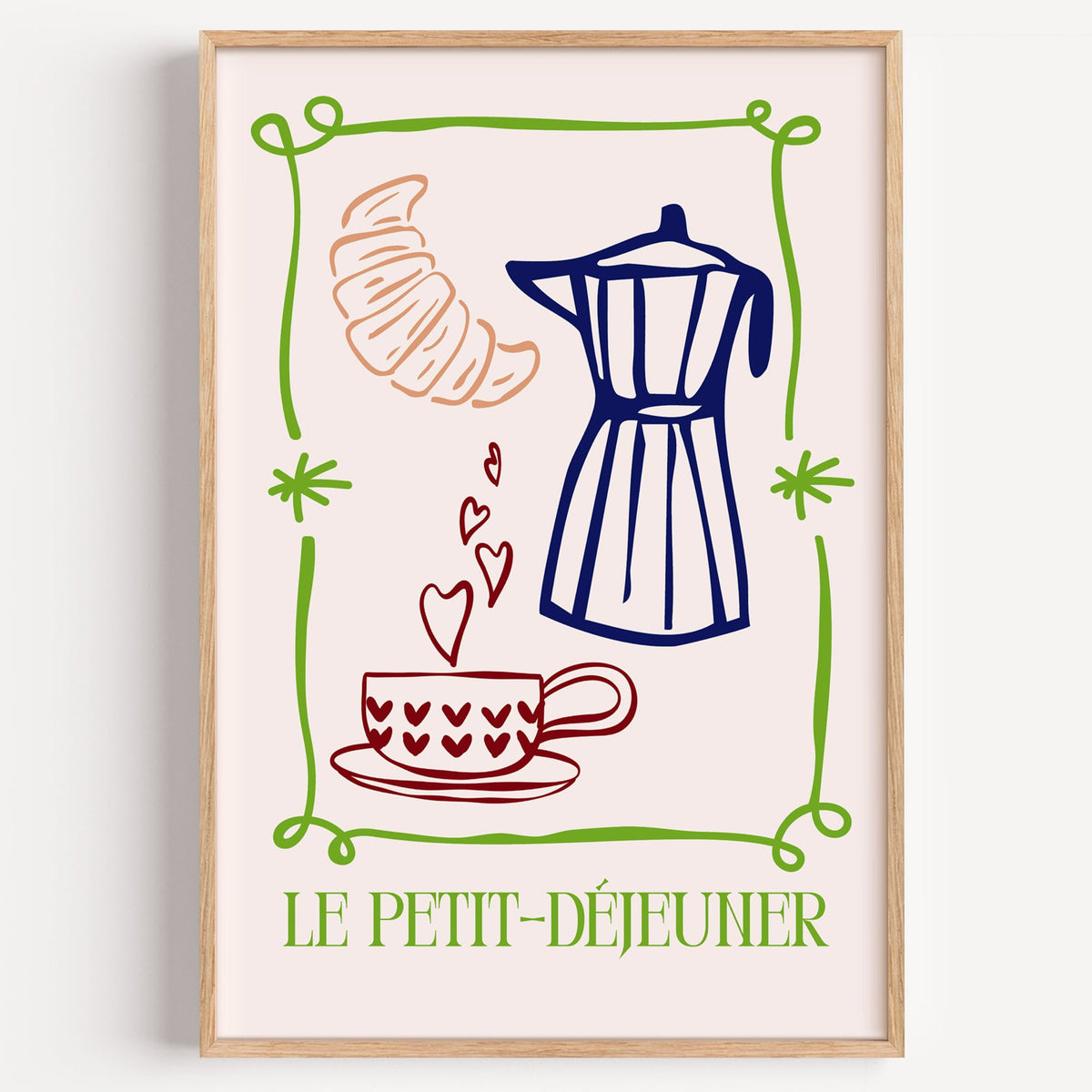 LE PETIT-DÉJEUNER moka pot and croissant print in a light oak frame on a plain white wall