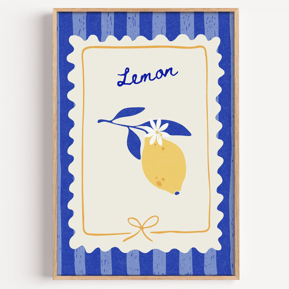 Lemon branch stamp print in a light oak frame on a plain white wall