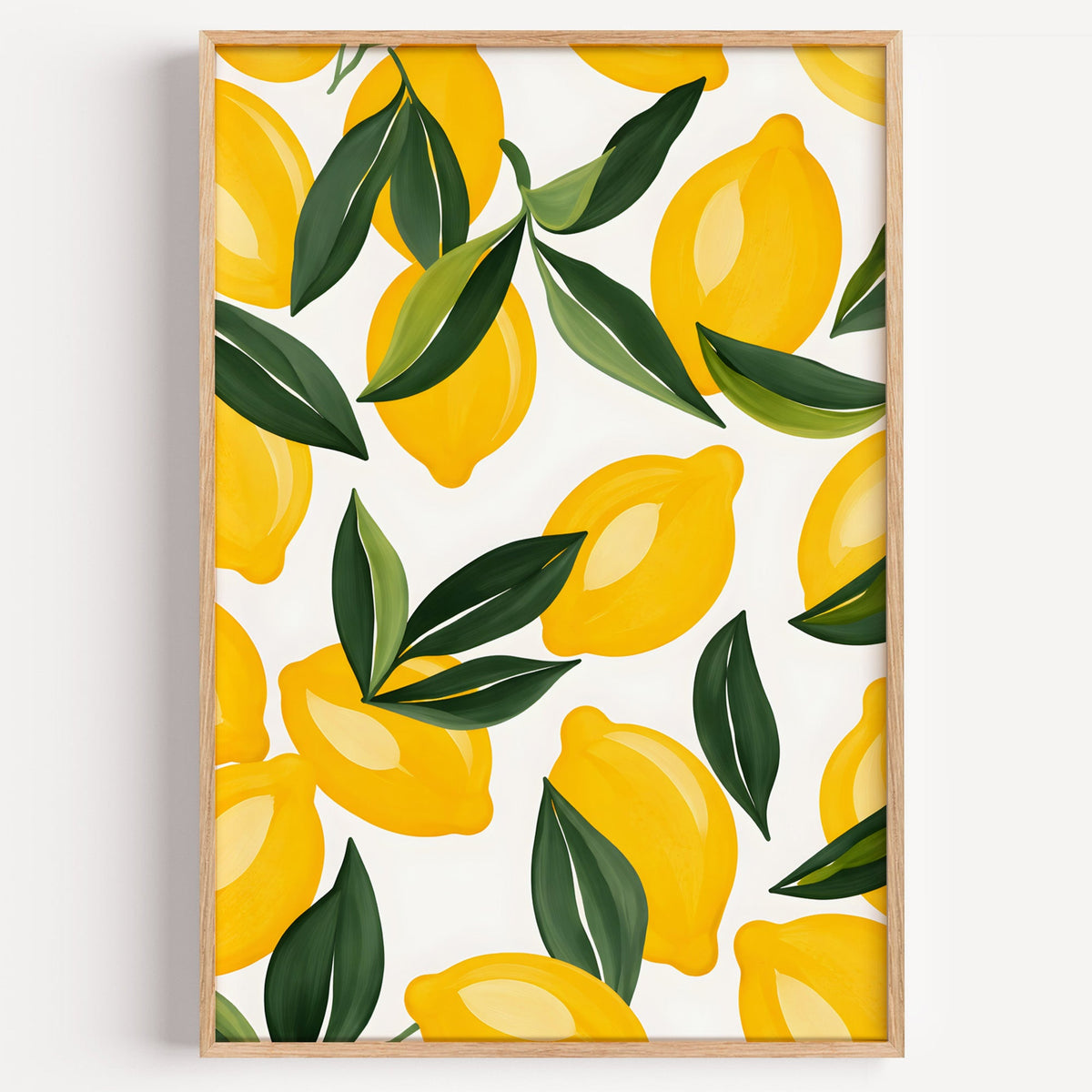 Lemon leaf pattern print in a light oak frame on a plain white wall