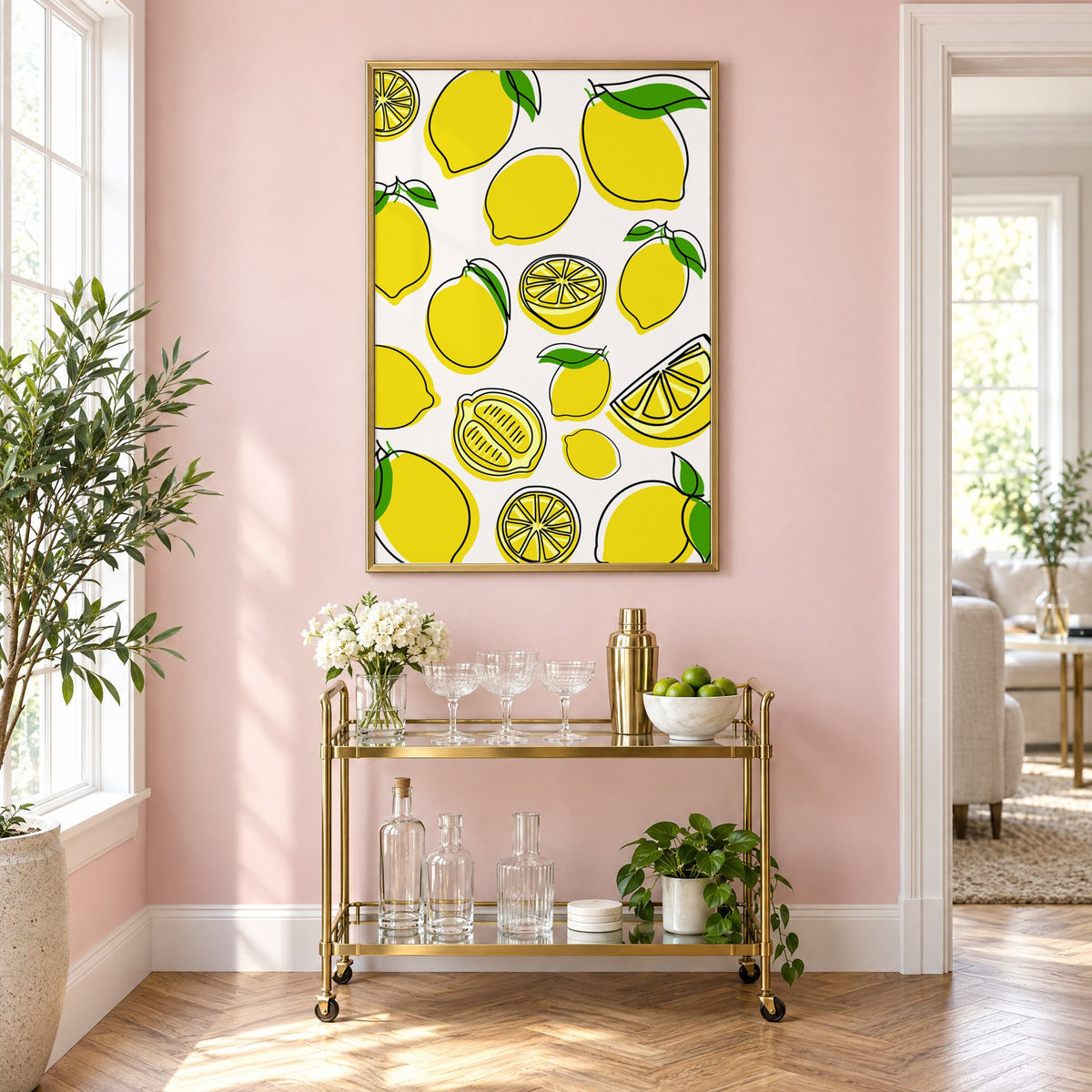 Lemon line art offset pattern print in a brass frame above a gold bar cart on a blush pink wall