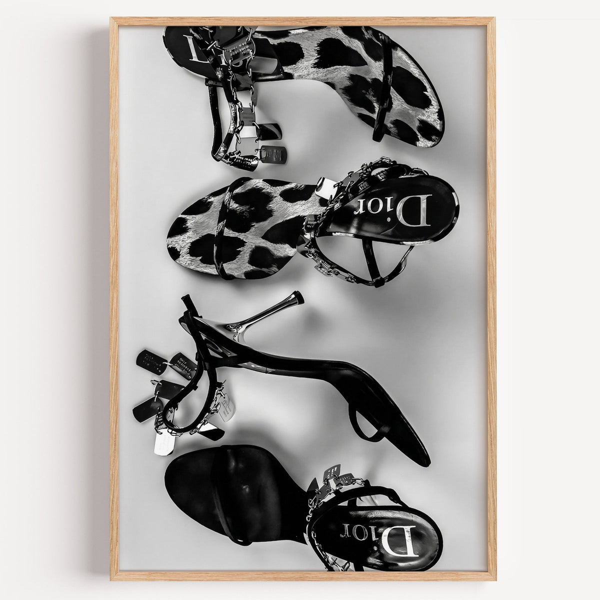 Strappy sandals with chain straps flat lay fashion print in a light oak frame on a plain white wall