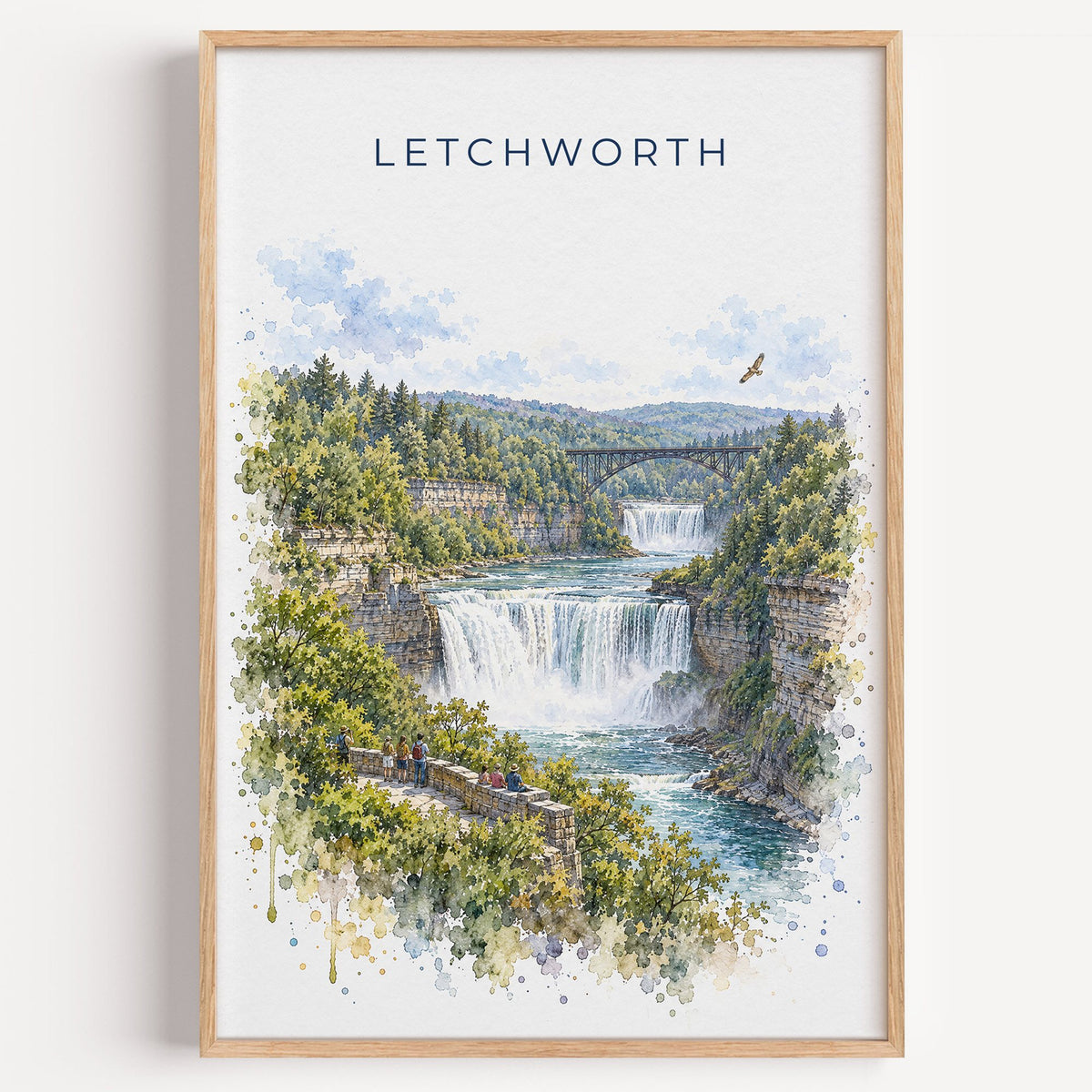 Letchworth State Park watercolor print in a light oak frame on a plain white wall