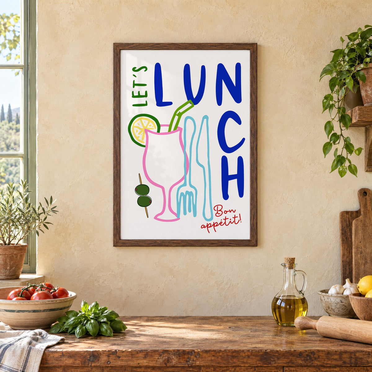 Let's Lunch cocktail and cutlery print in a walnut frame above a rustic Italian kitchen table with tomatoes
