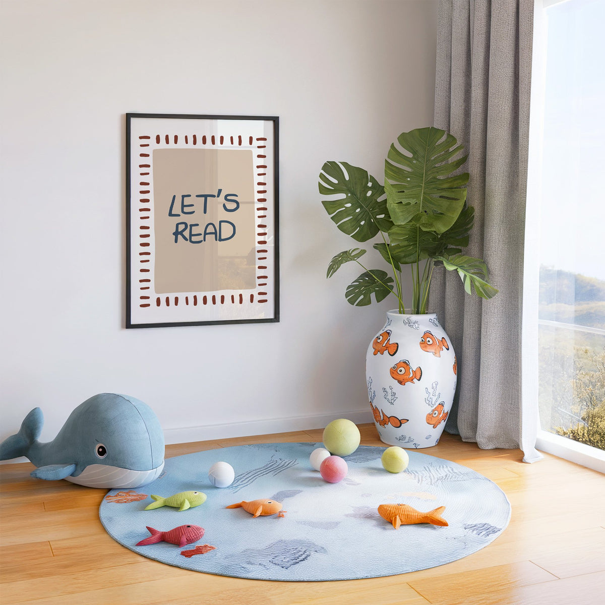 Lets read typography nursery print in a black frame in a playroom with an ocean rug and whale plush