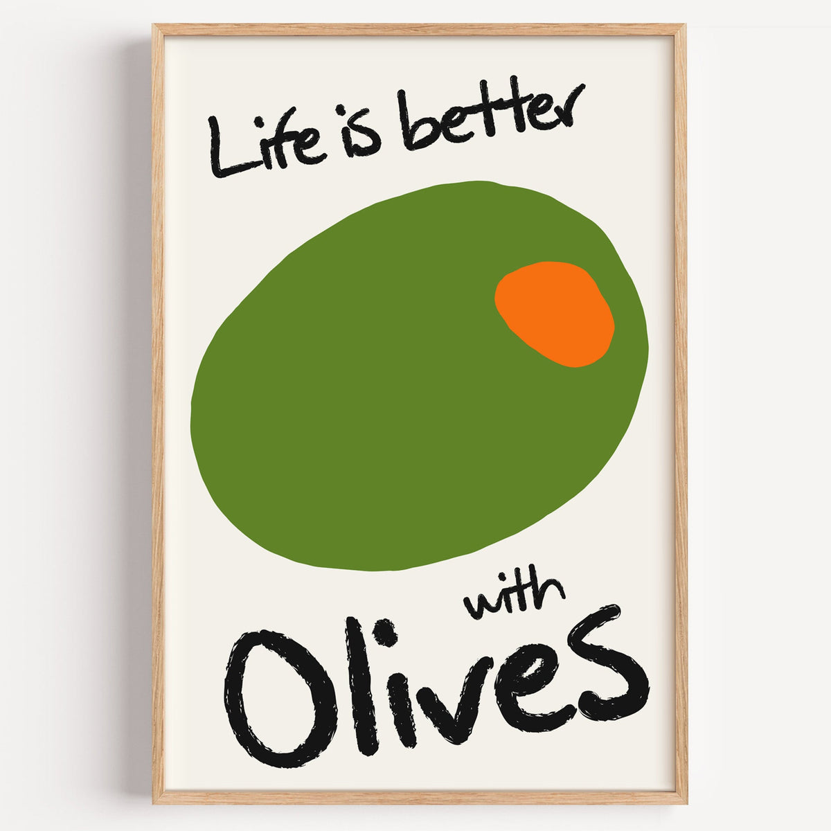 Life is better with olives print in a light oak frame on a plain white wall