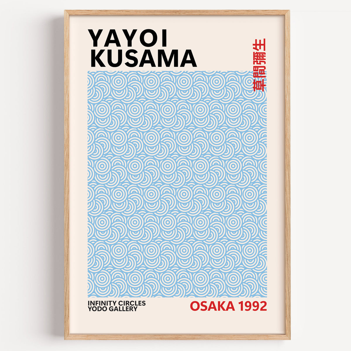 Yayoi Kusama inspired light blue circle pattern print in a wood frame on a plain wall