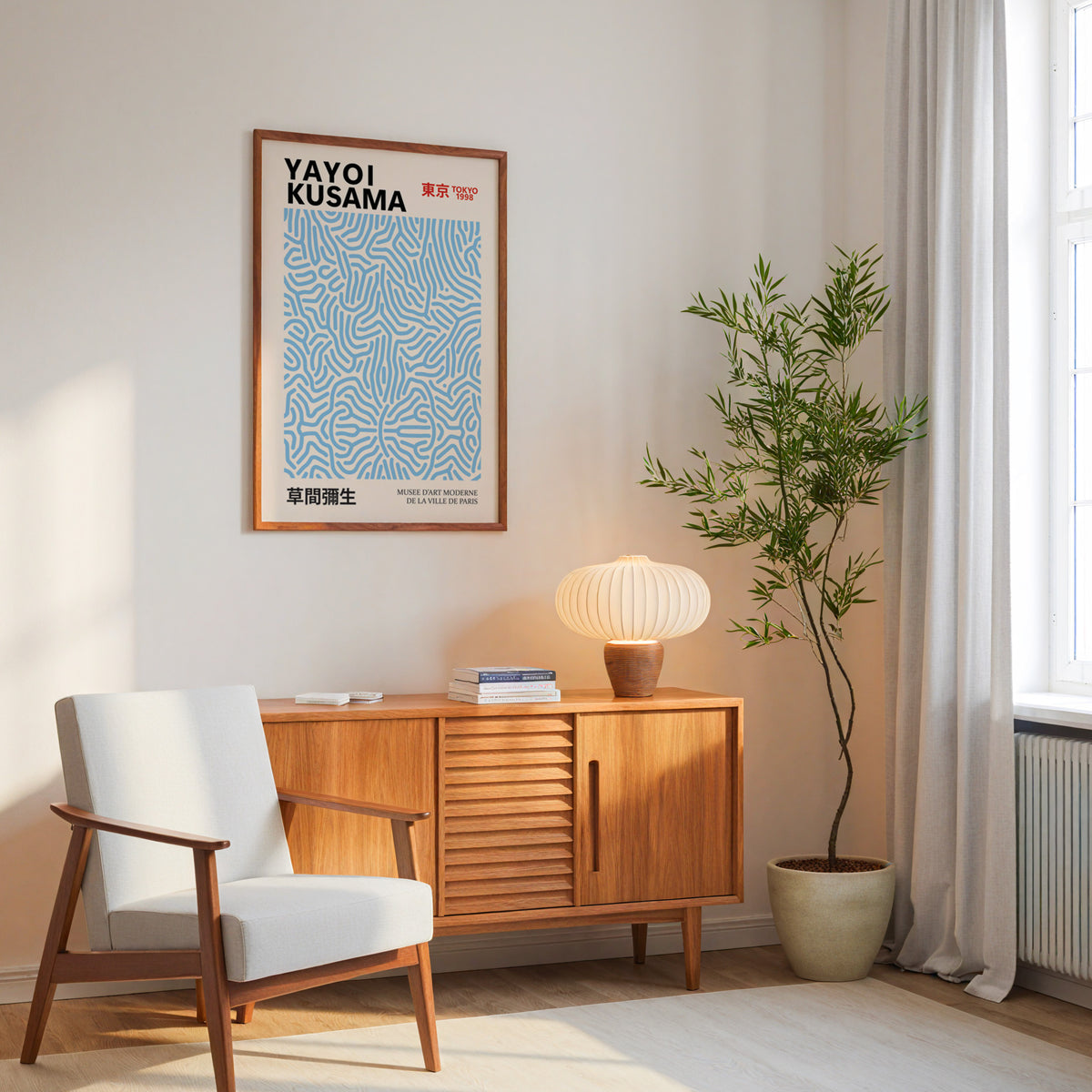 Yayoi Kusama inspired light blue squiggle pattern print above a mid-century sideboard