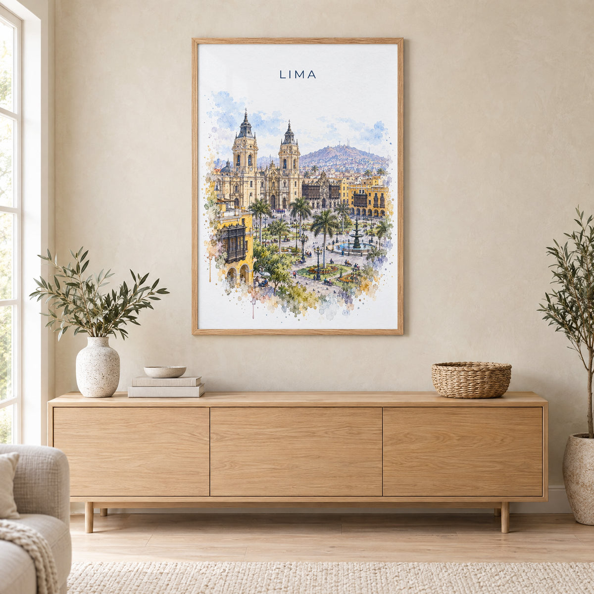 Lima, Peru watercolor print in an oak frame above a light wood sideboard in a Scandinavian living room