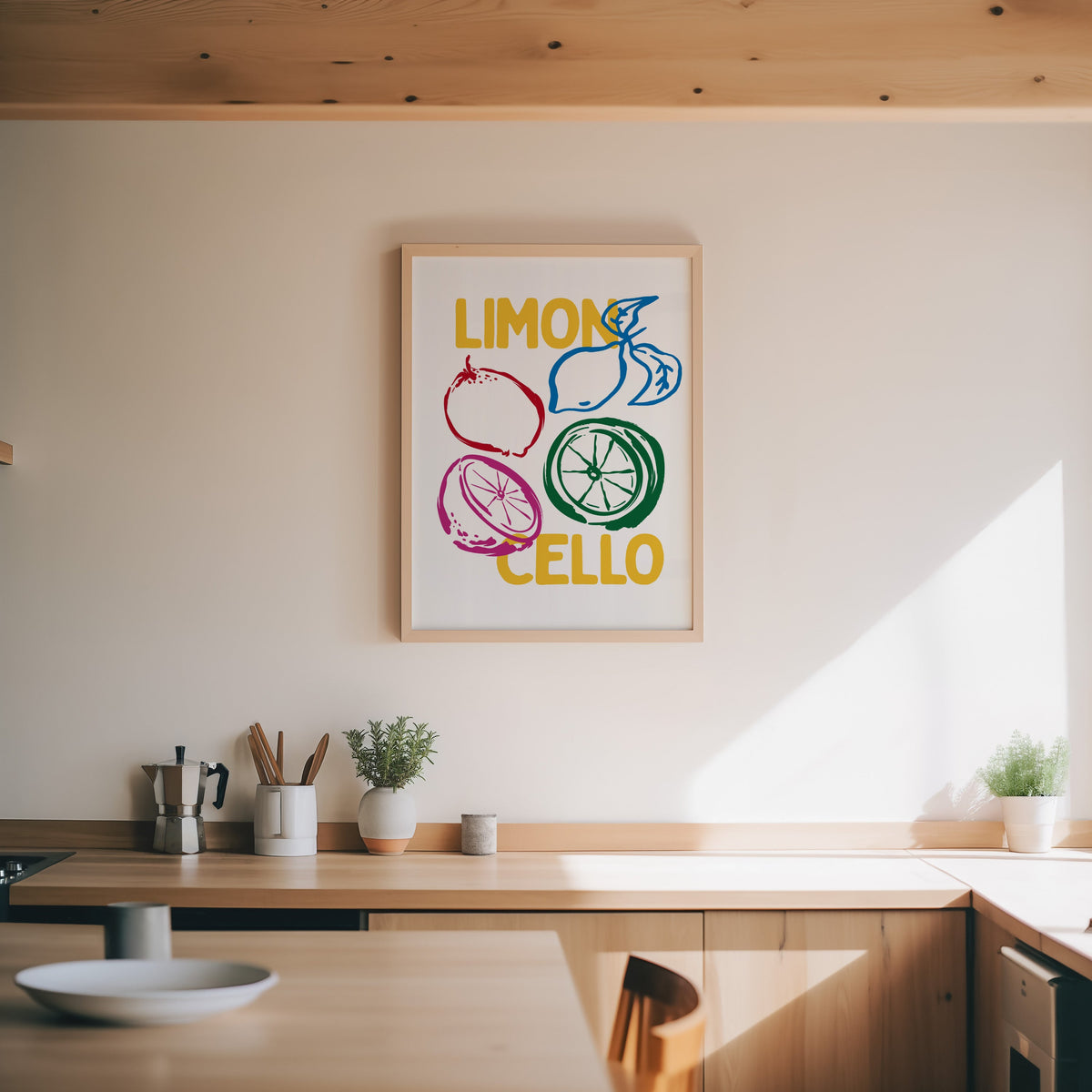 Limoncello lemon sketch print in an oak frame above a wood counter with a moka pot and herbs
