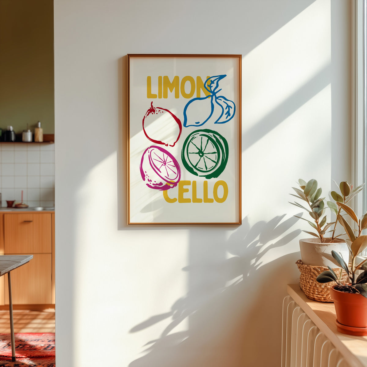 Limoncello lemon sketch print shown in a gold frame in sunlight with plants and a kitchen beyond