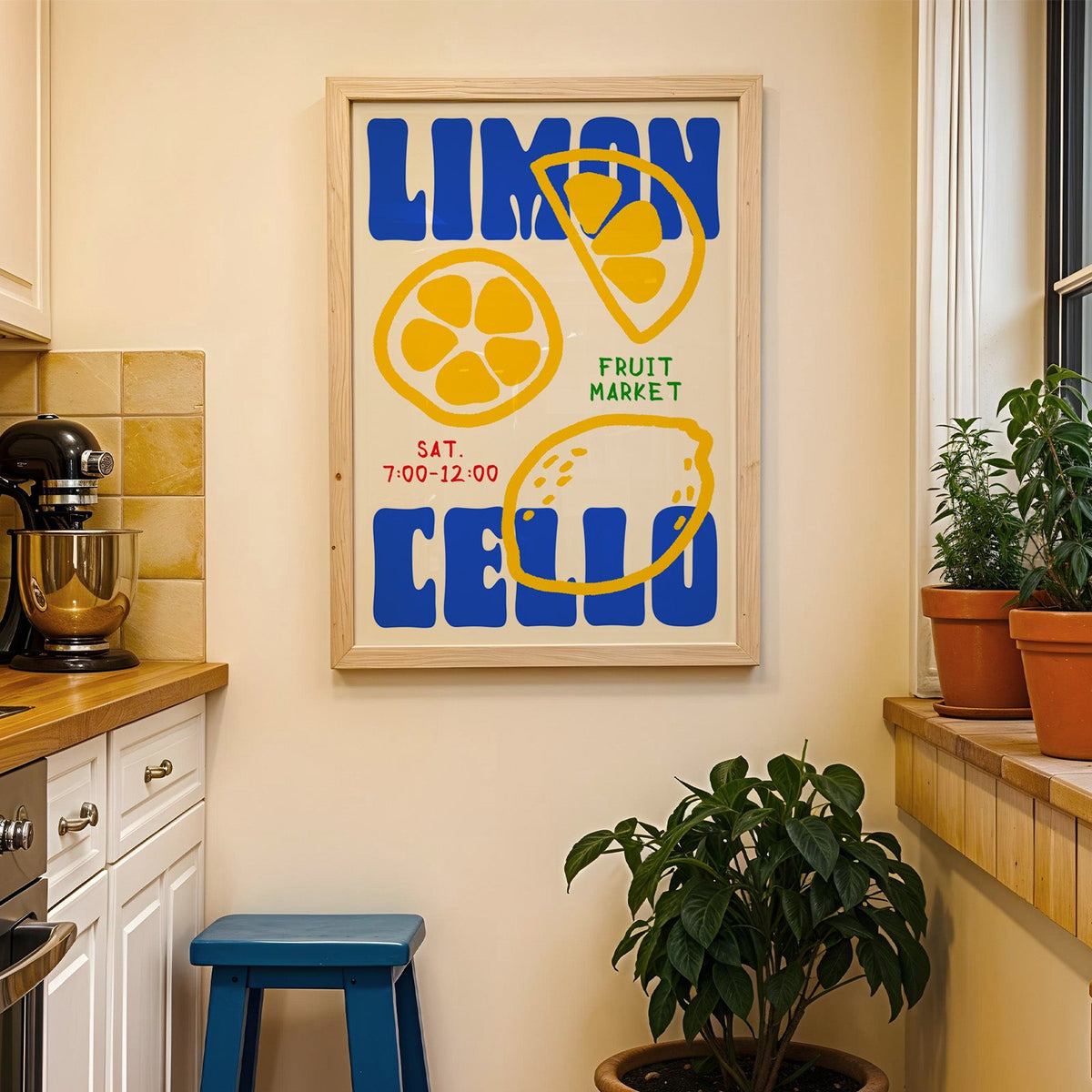 Limoncello lemon print in a wood frame on a yellow tiled kitchen wall