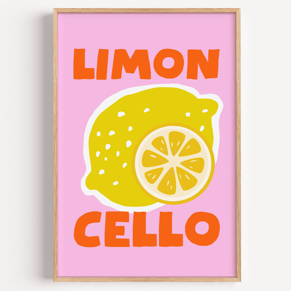 Limon Cello lemon and slice print in a light oak frame on a plain white wall