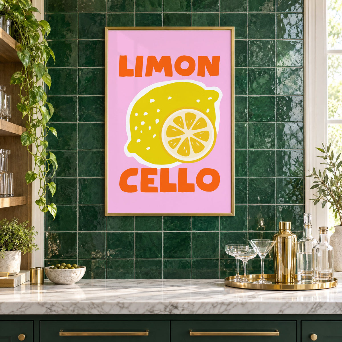 Limon Cello lemon and slice print in a brass frame on emerald green tiles above a home bar with coupe glasses