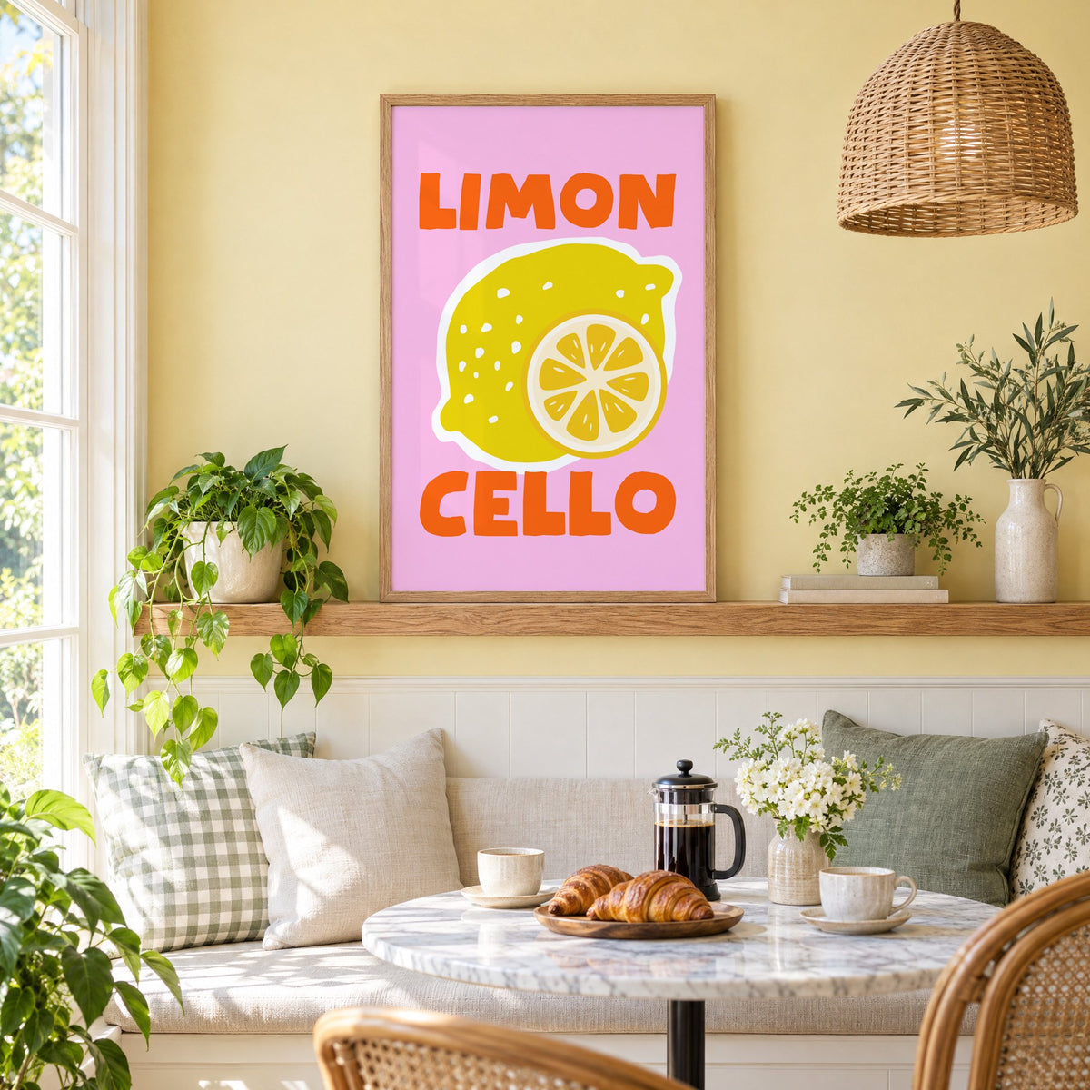 Limon Cello lemon and slice print in an oak frame on a picture ledge above a sunny breakfast nook