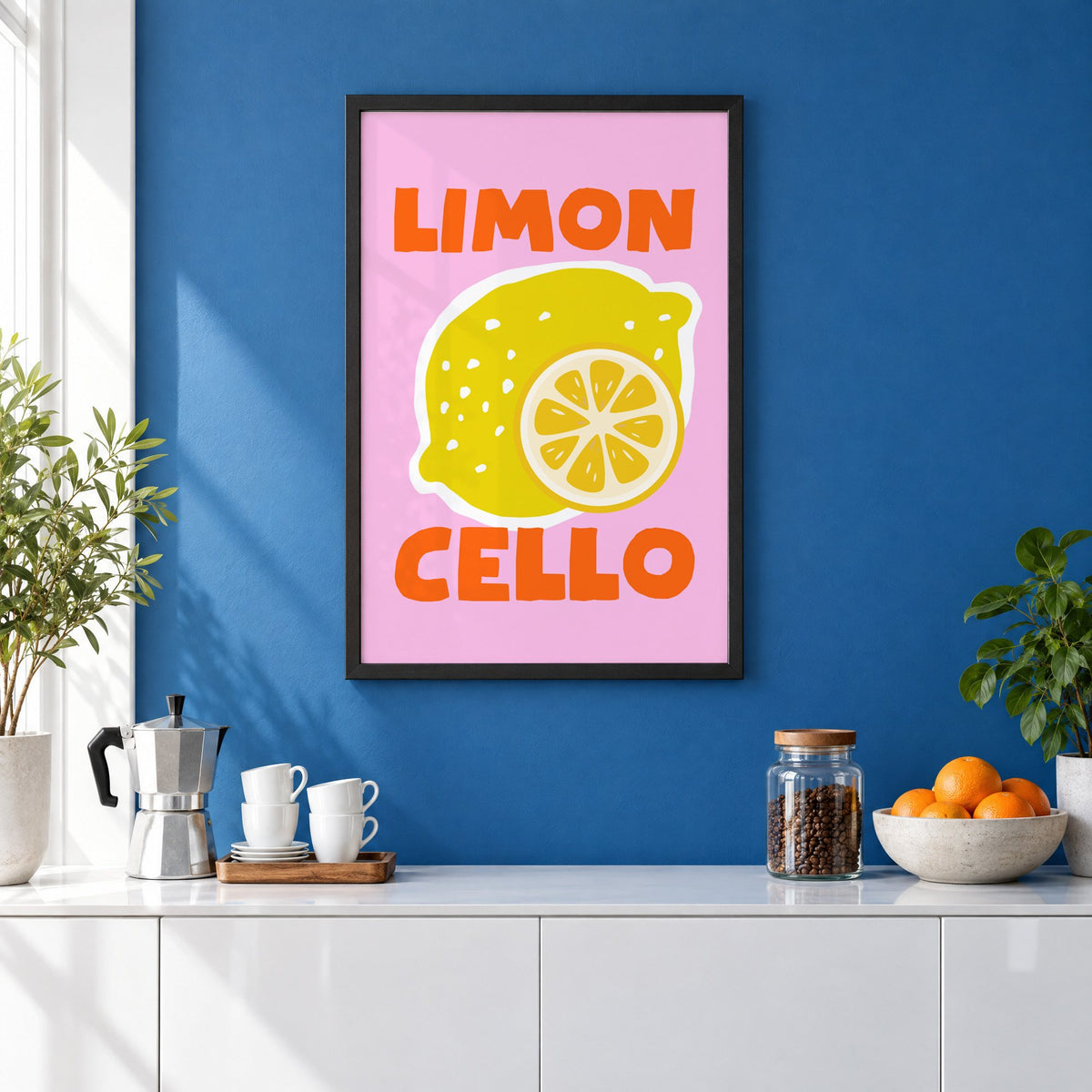 Limon Cello lemon and slice print in a black frame on a cobalt blue wall above a coffee station