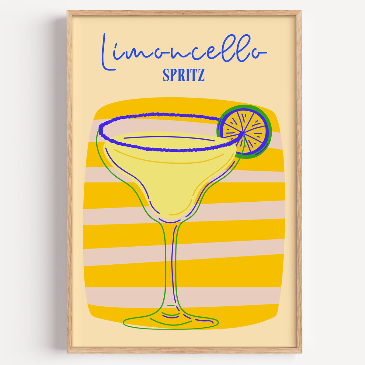 Limoncello Spritz yellow stripe print in a light oak frame on a plain white wall