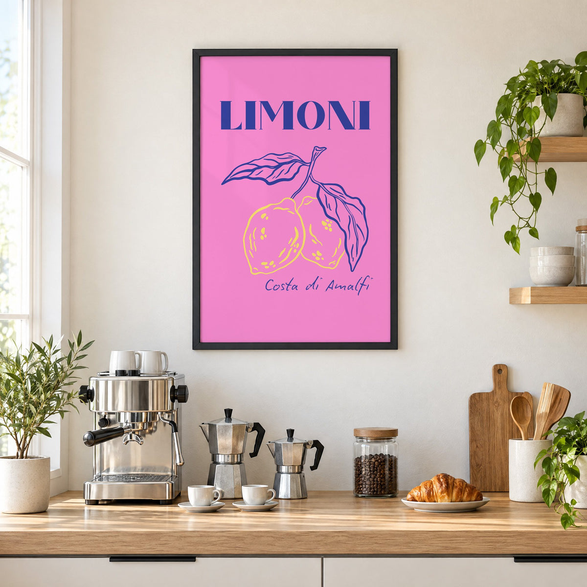 LIMONI Costa di Amalfi lemon branch print in a black frame above a home espresso bar with moka pots and espresso cups