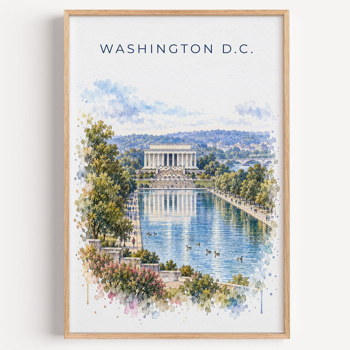 Lincoln Memorial watercolor print in a light oak frame on a plain white wall