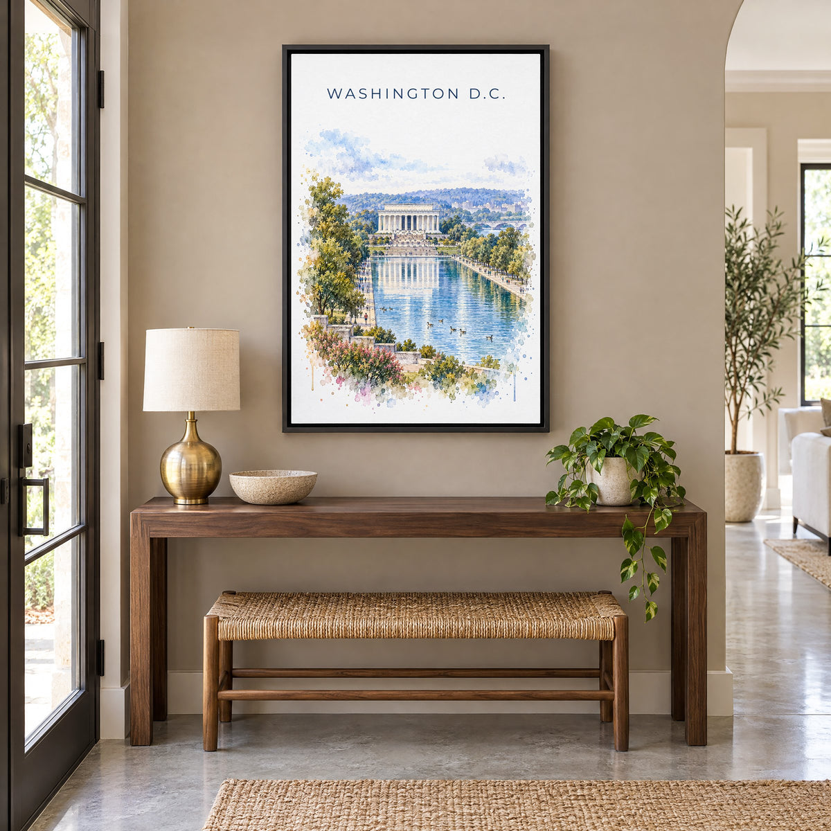 Lincoln Memorial watercolor print as a black floater canvas above a walnut console and woven bench in an entryway