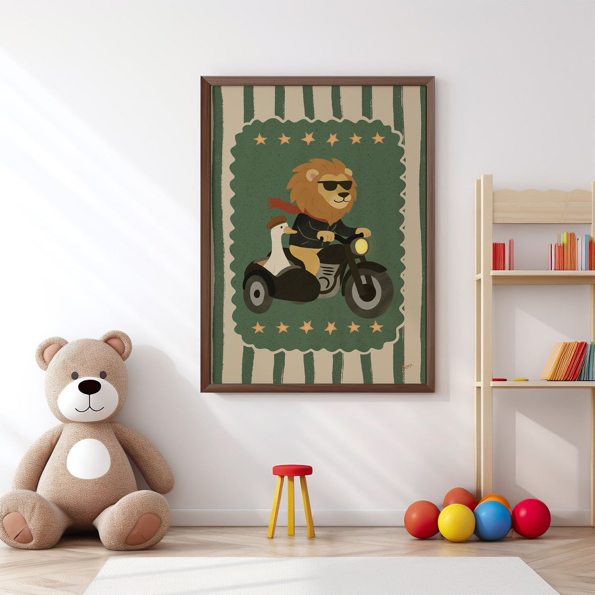 Lion on motorcycle with goose sidecar nursery print in a walnut frame above a big teddy bear by a bookshelf
