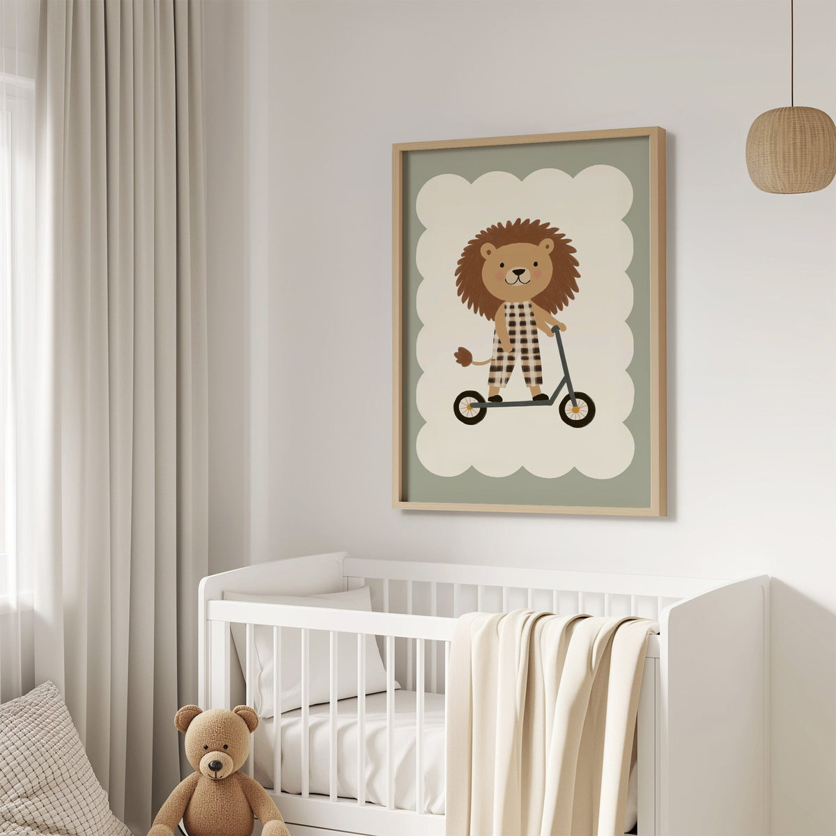 Lion on scooter gingham nursery print in an oak frame above a white crib with a teddy bear