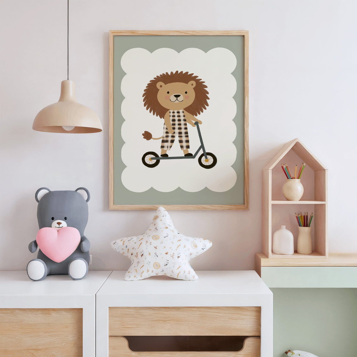 Lion on scooter gingham nursery print in an oak frame above a white dresser with a star pillow and house shelf