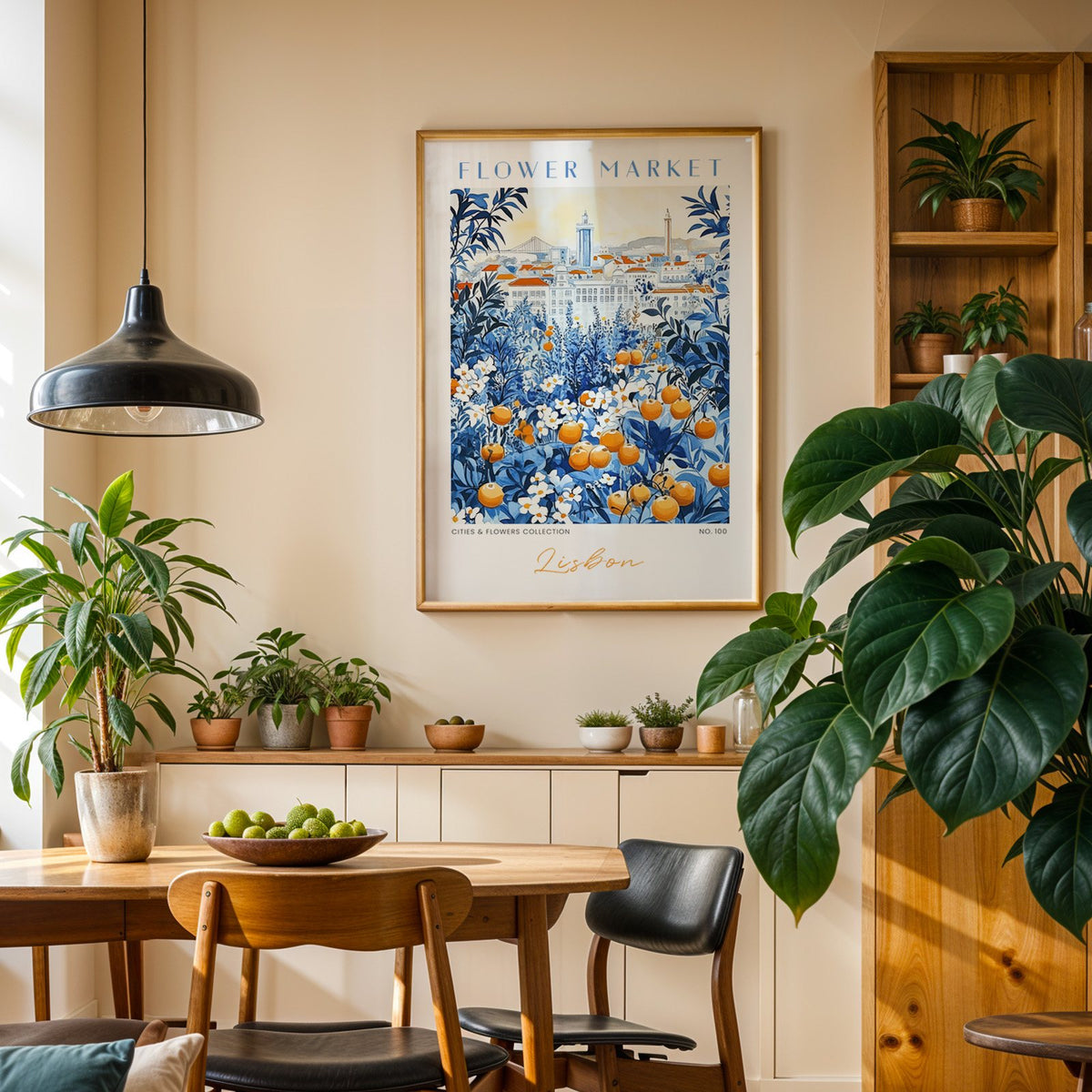 Lisbon flower market print in an oak frame above a dining sideboard lined with potted plants