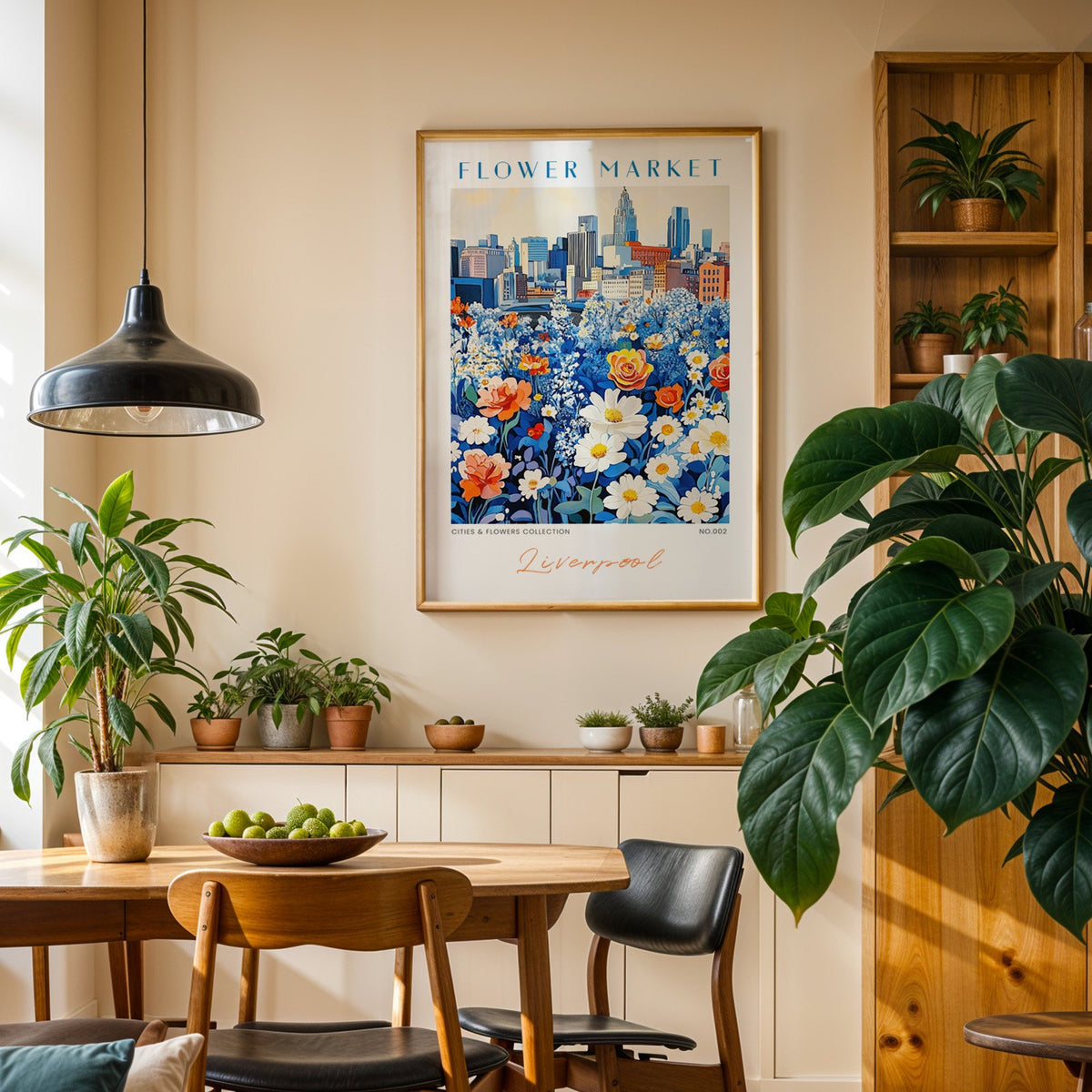 Liverpool flower market print in an oak frame above a dining sideboard lined with potted plants