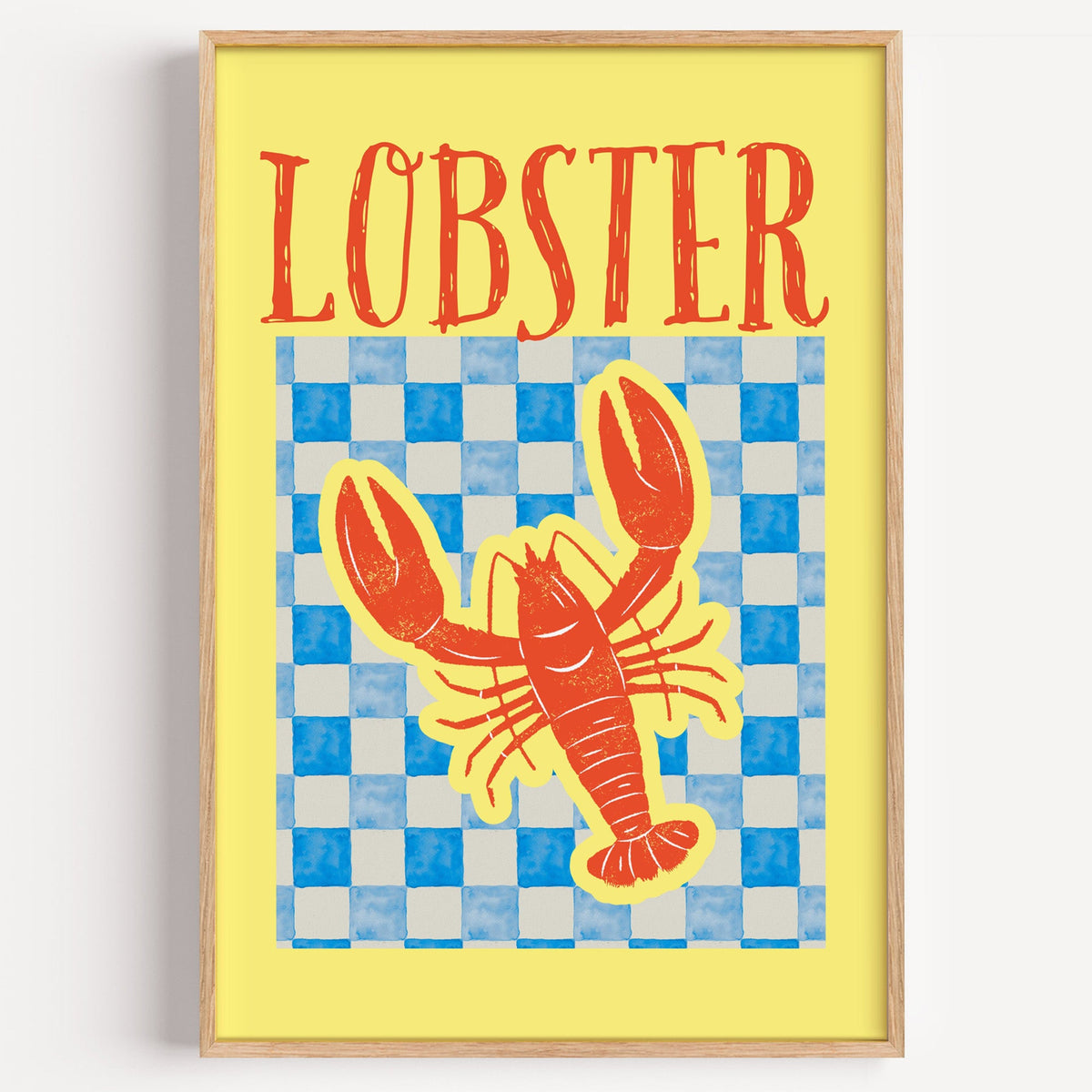 Lobster blue check print in a light oak frame on a plain white wall