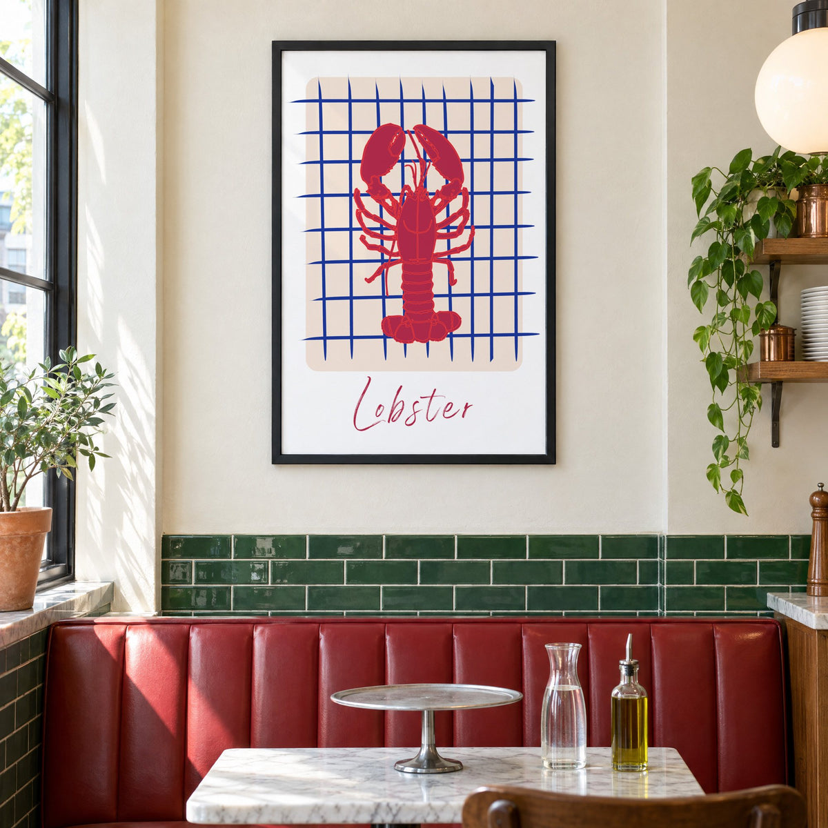Lobster on cobalt grid print in a black frame above a red leather booth in a sunny pizzeria
