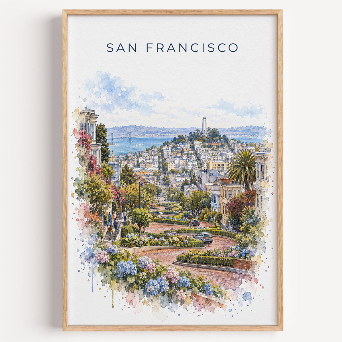 Lombard Street San Francisco watercolor print in a light oak frame on a plain white wall