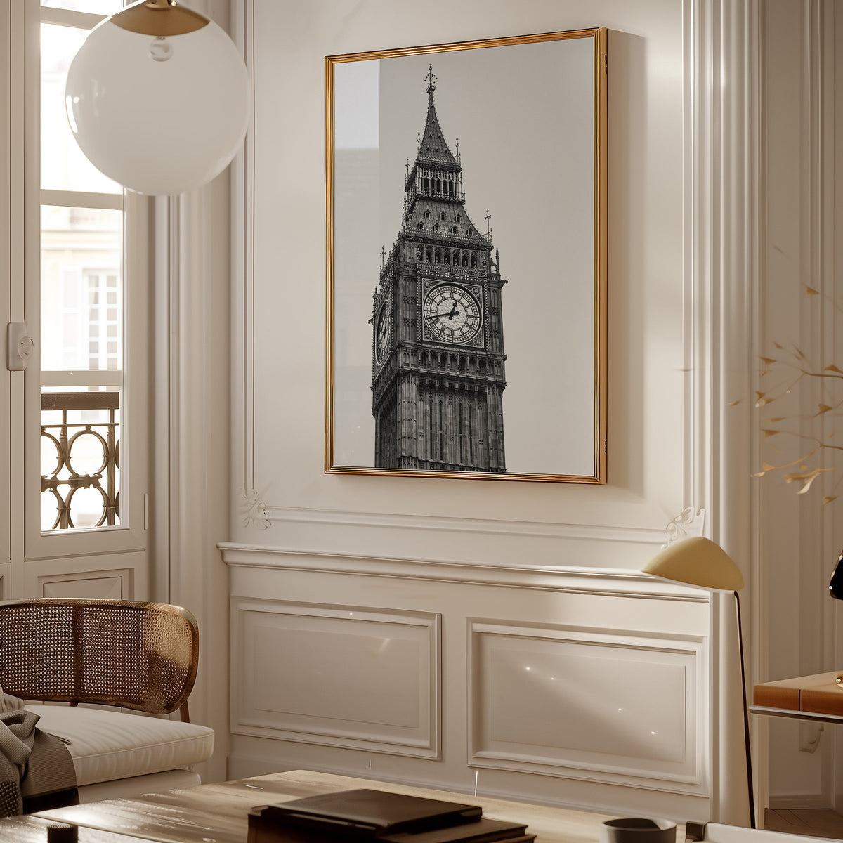 Big Ben clock tower low-angle photo print shown in a gold frame in a Parisian paneled living room