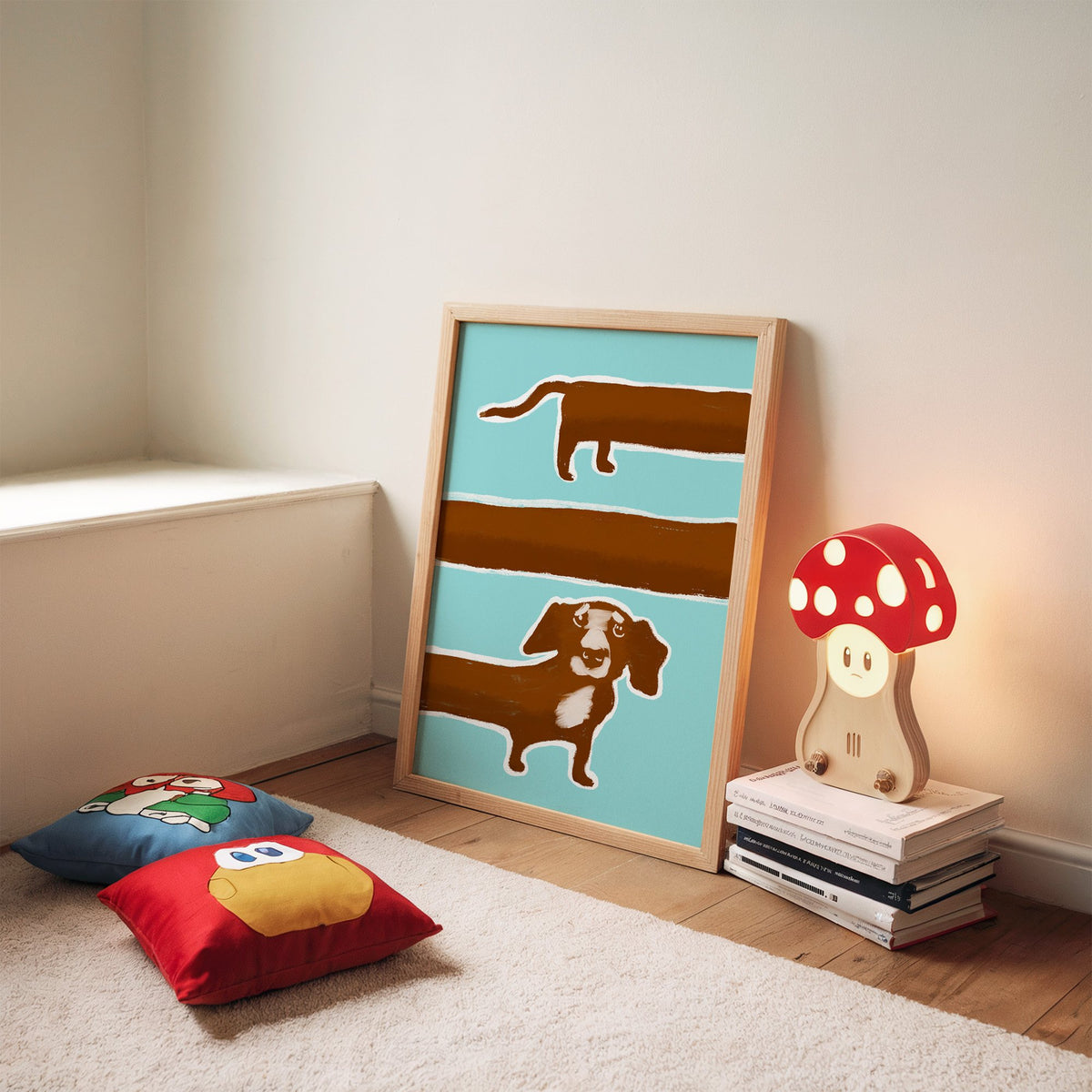 Extra long dachshund in three rows nursery print in an oak frame leaning on a rug beside a mushroom lamp and floor cushions