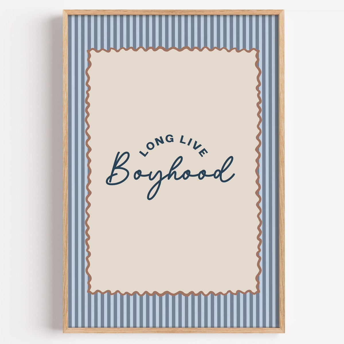 Long live boyhood nursery print in a light oak frame on a plain white wall